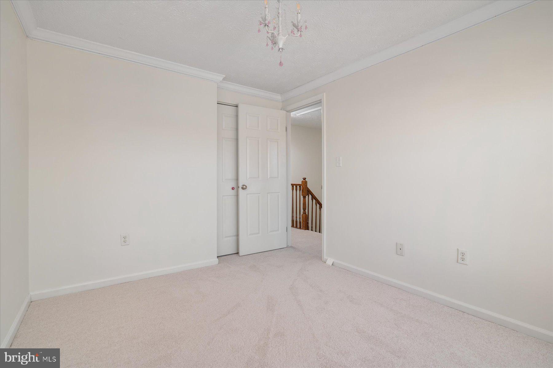 727 Dayspring Drive Odenton, MD 21113 - Photo 27 of 44 a view of a room with an empty space