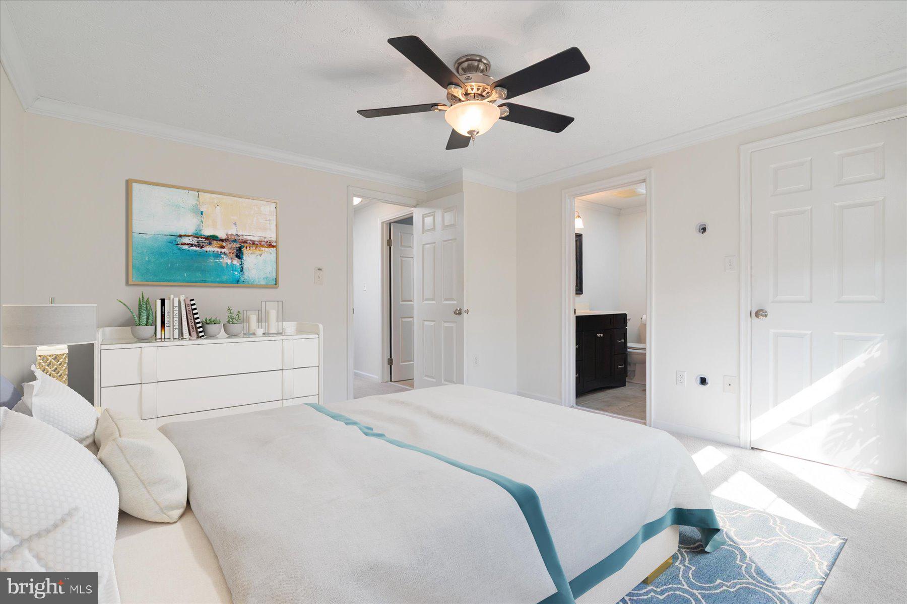 727 Dayspring Drive Odenton, MD 21113 - Photo 3 of 44 a bedroom with a bed and a large mirror