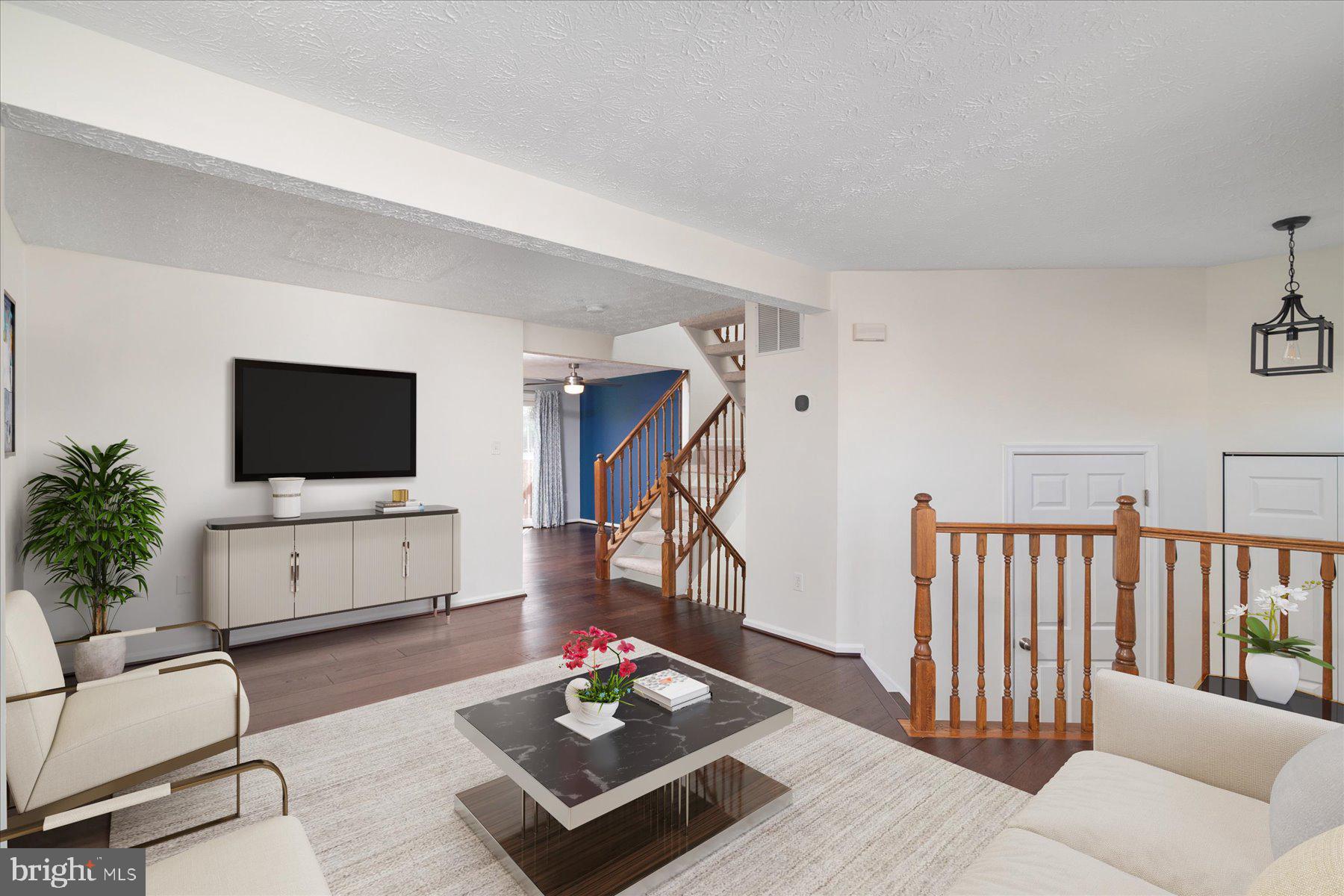 727 Dayspring Drive Odenton, MD 21113 - Photo 4 of 44 a living room with furniture and a flat screen tv