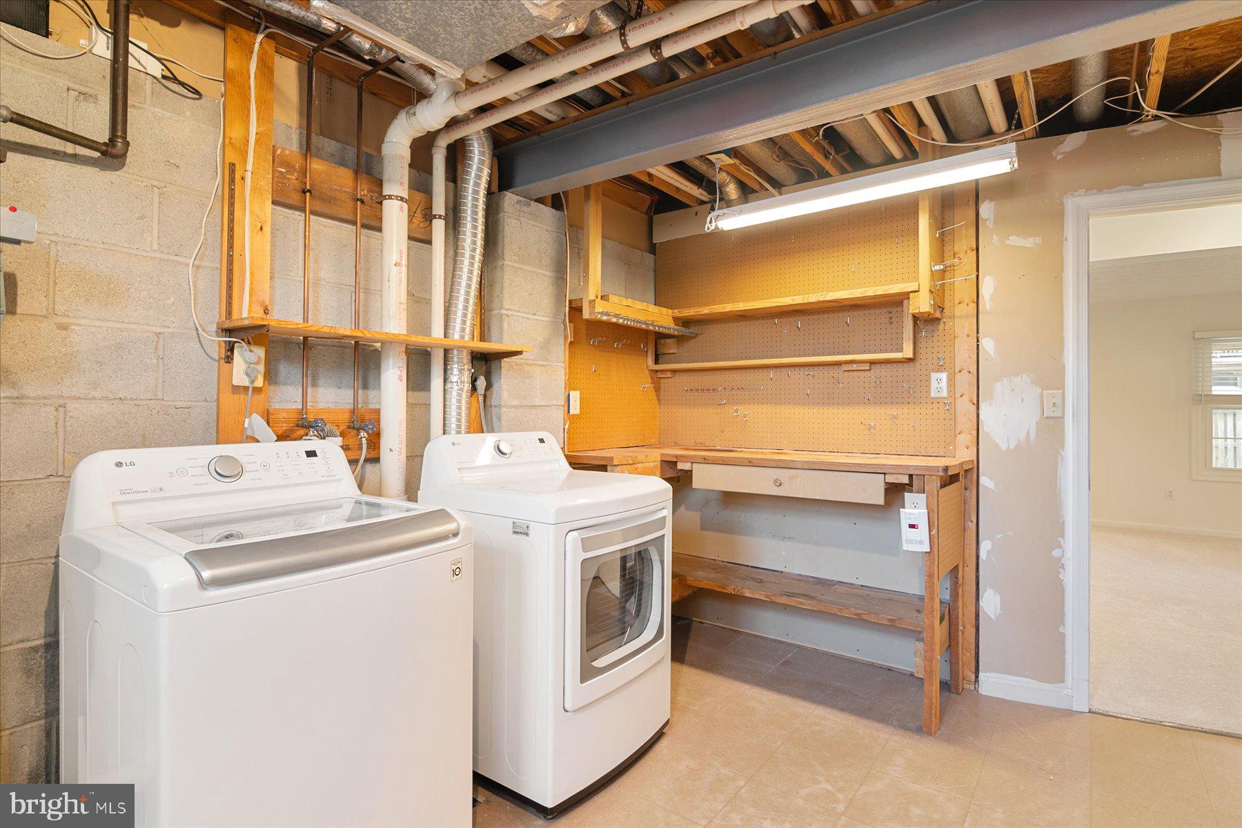 727 Dayspring Drive Odenton, MD 21113 - Photo 44 of 44 a utility room with dryer and washer