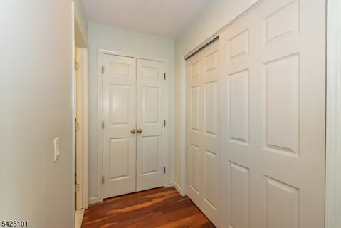 a view of a livingroom with wooden floor