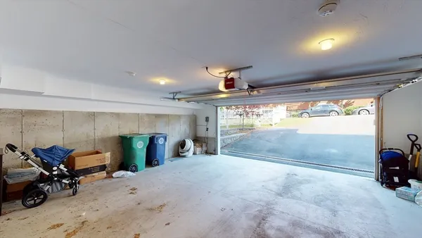 a picture of a room with a white wall and sign