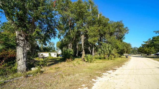 a view of swimming pool with a patio
