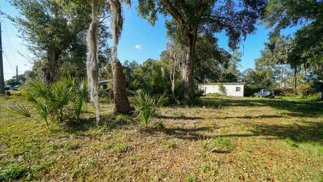 a fire hydrant in the middle of a field