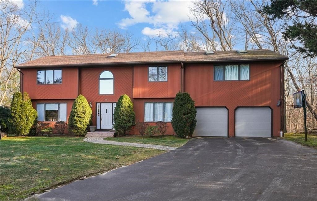 Exterior front with 2-car garage