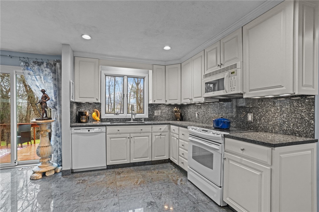 15 Jennifer Circle Cranston, RI 02921 - Photo 14 of 50 Kitchen with slider to deck