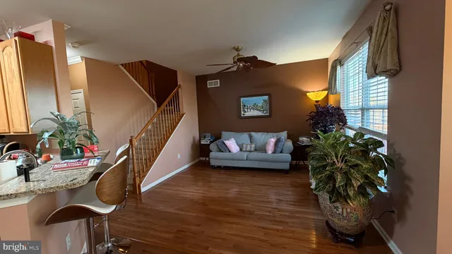 a room with a bed and a flat screen tv