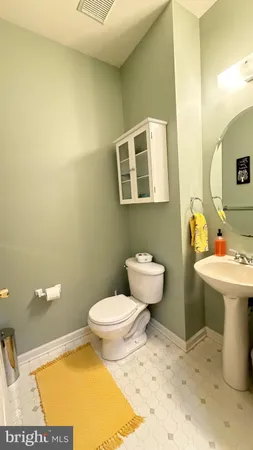 a bathroom with a sink and a toilet