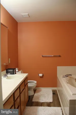 a view of backyard with seating space