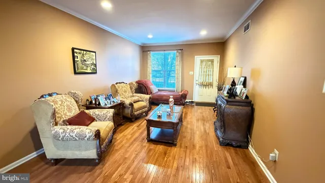 a living room with furniture and a couch
