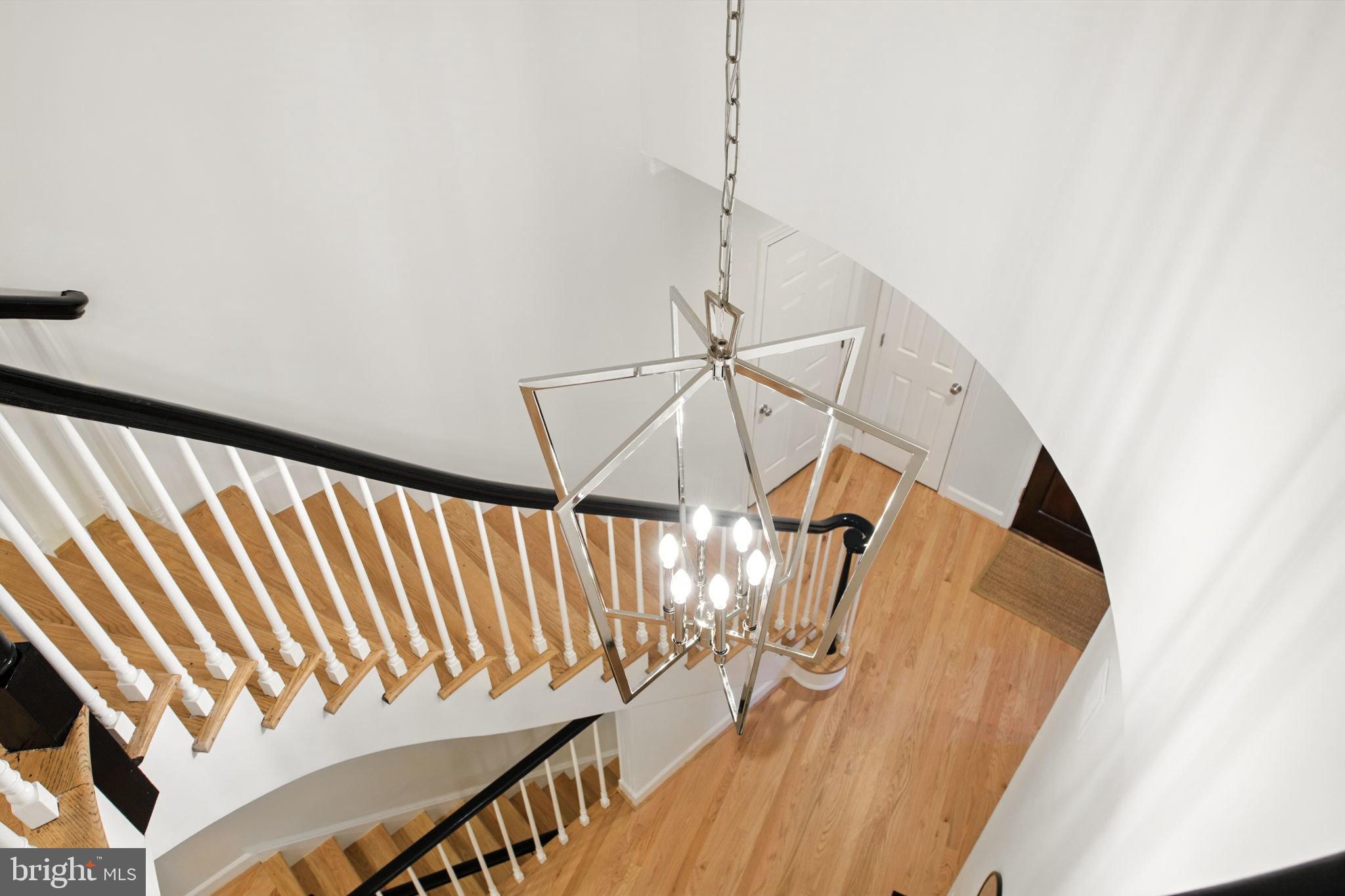 4730 Foxhall Crescent Northwest Washington, DC 20007 - Photo 16 of 37 a view of staircase with white walls
