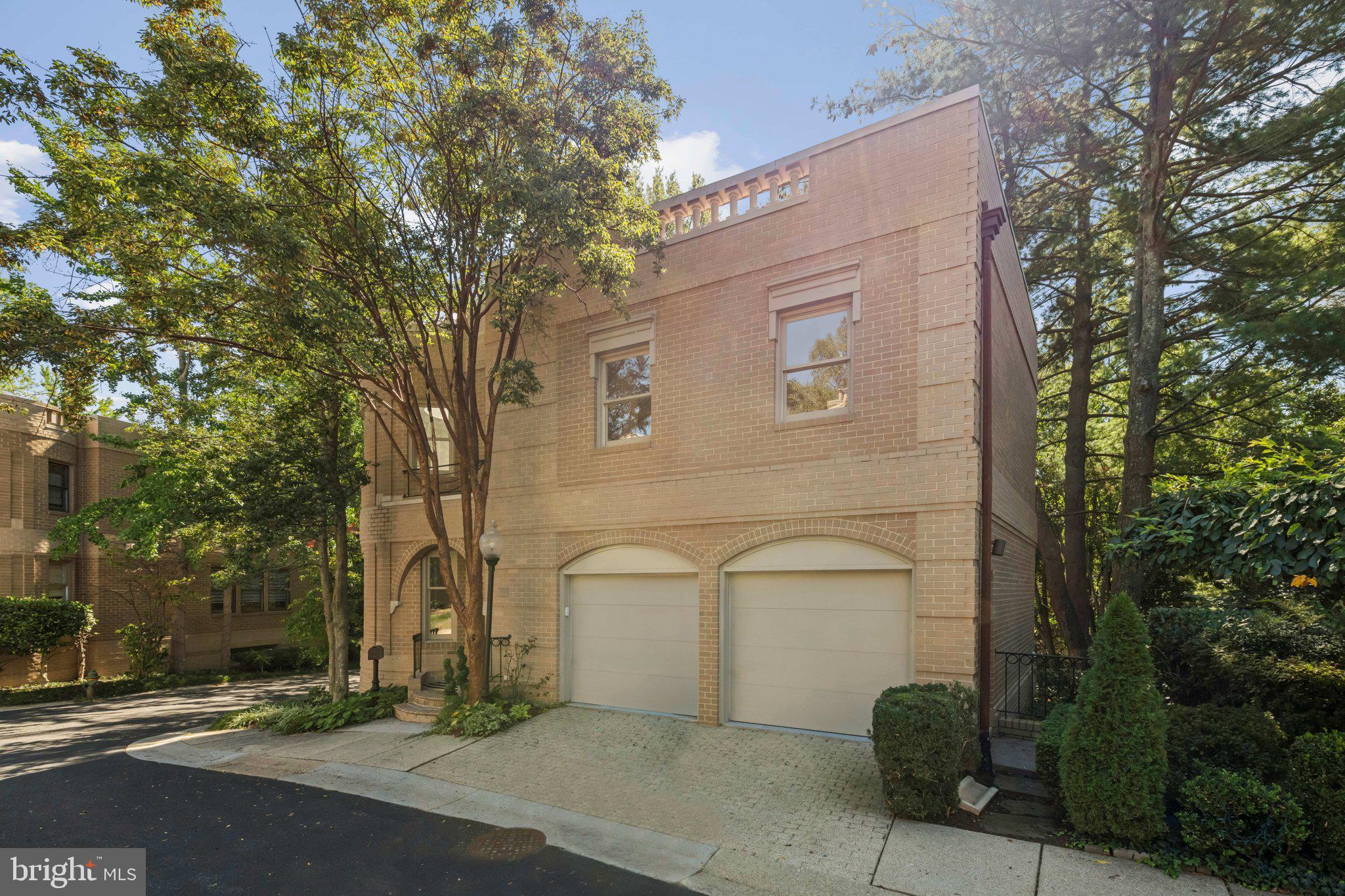 4730 Foxhall Crescent Northwest Washington, DC 20007 - Photo 2 of 37 front view of a house with a street