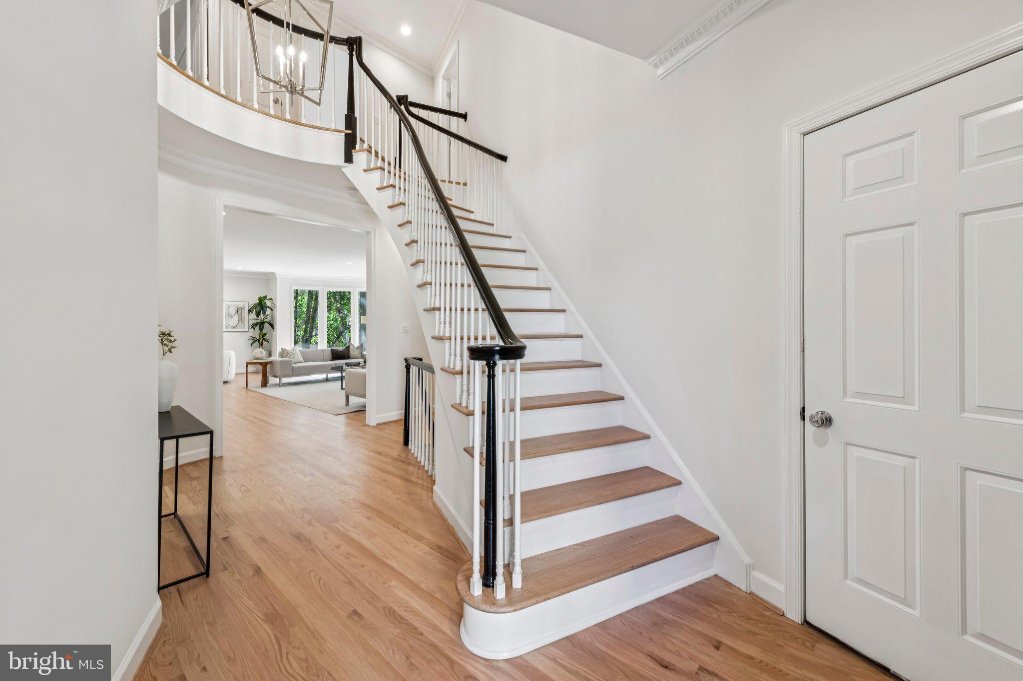 4730 Foxhall Crescent Northwest Washington, DC 20007 - Photo 4 of 37 a view of entryway and hall with wooden floor