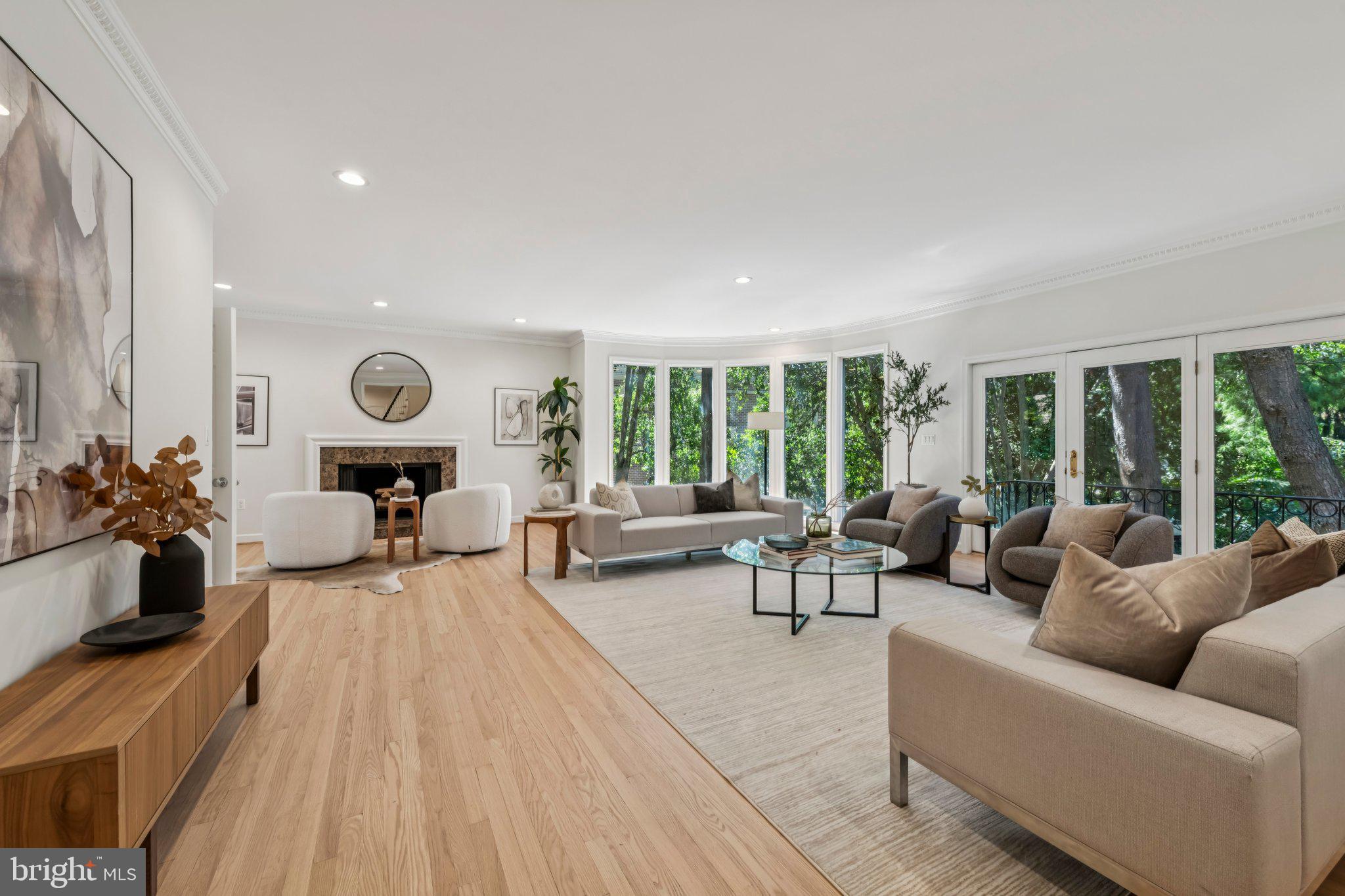 4730 Foxhall Crescent Northwest Washington, DC 20007 - Photo 5 of 37 a living room with furniture and large windows