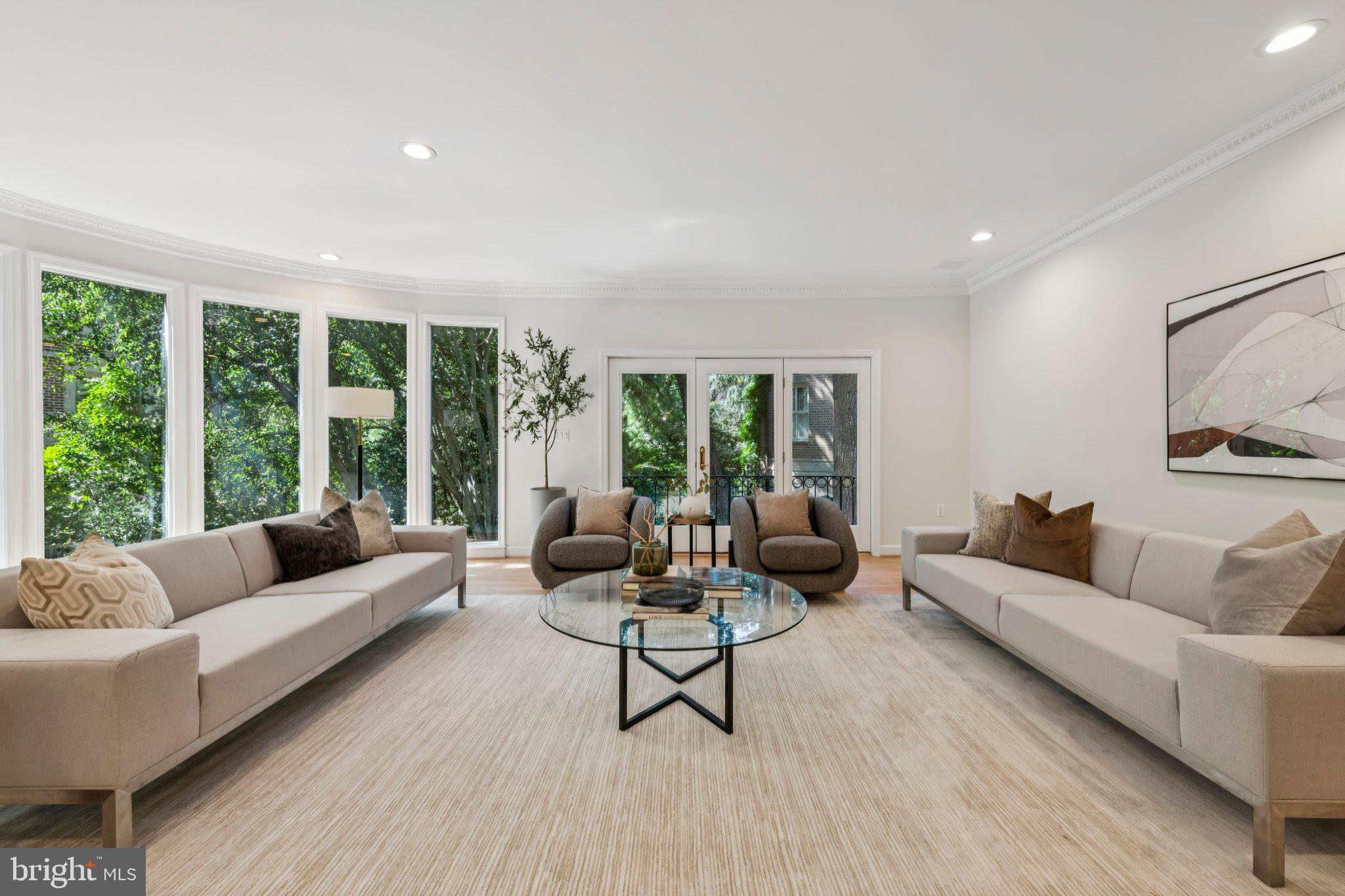 4730 Foxhall Crescent Northwest Washington, DC 20007 - Photo 6 of 37 a living room with furniture and large windows