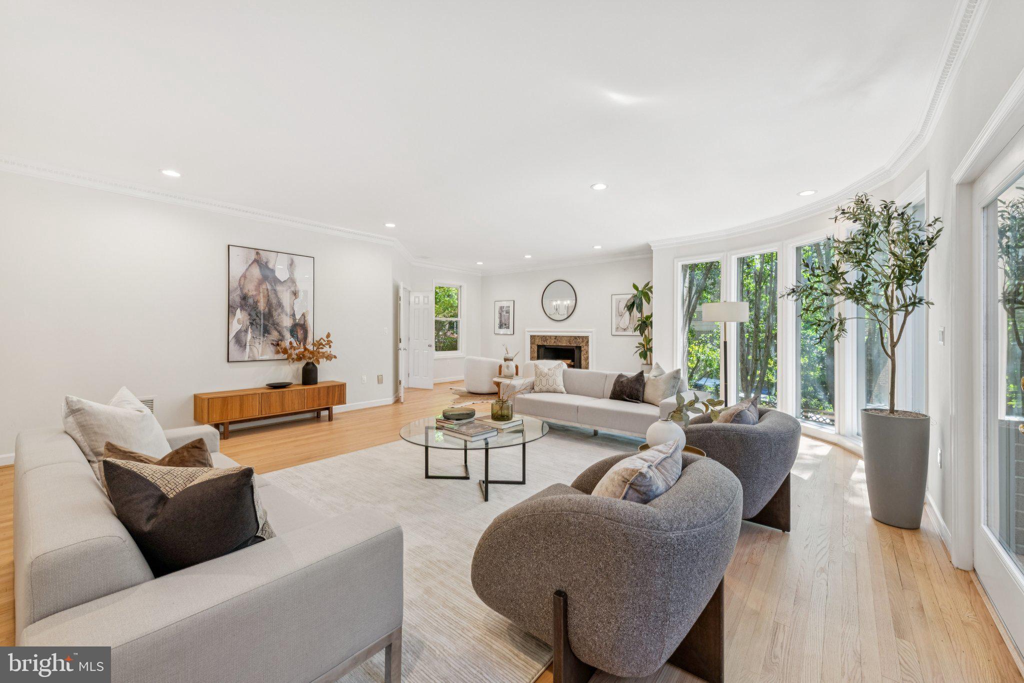 4730 Foxhall Crescent Northwest Washington, DC 20007 - Photo 7 of 37 a living room with furniture and a large window