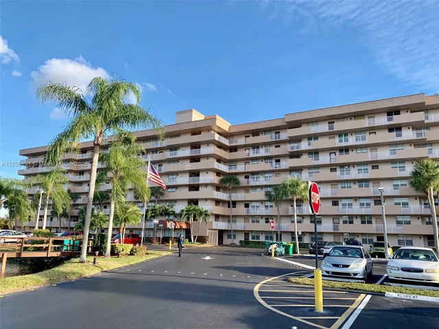 a front view of a building with street view