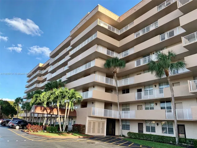 a view of a building with a street