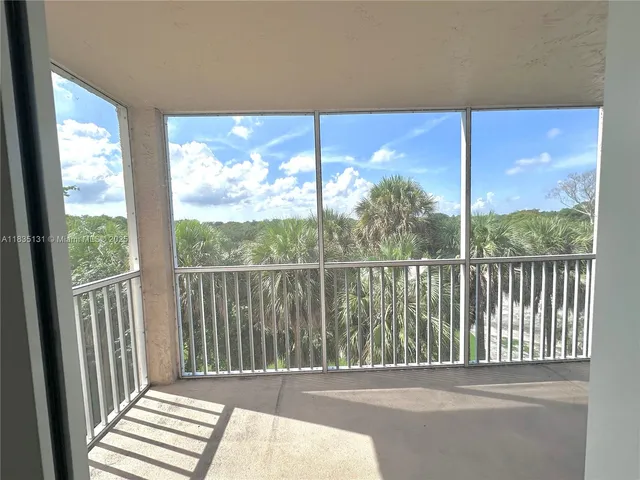 a balcony view with a ocean view