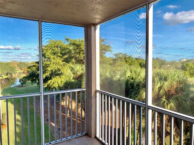 a view of a door and a balcony