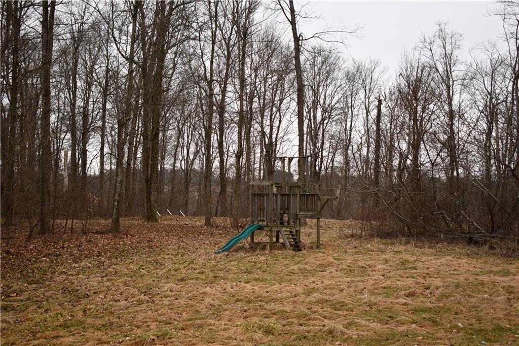 74 Tr784 Burgettstown, PA 15021 - Photo 11 of 22 a view of outdoor space with deck and trees