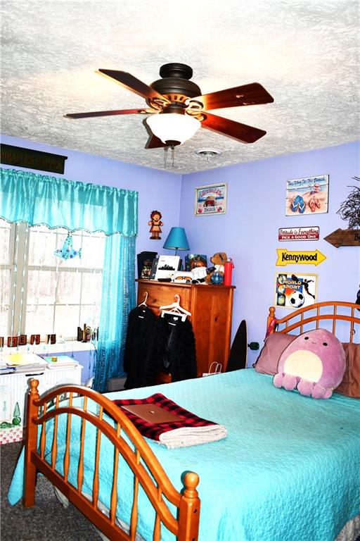 74 Tr784 Burgettstown, PA 15021 - Photo 19 of 22 a bedroom with a bed and a chandelier