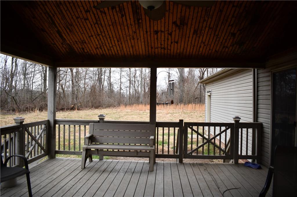 74 Tr784 Burgettstown, PA 15021 - Photo 10 of 22 a view of a balcony with wooden floor and outdoor seating
