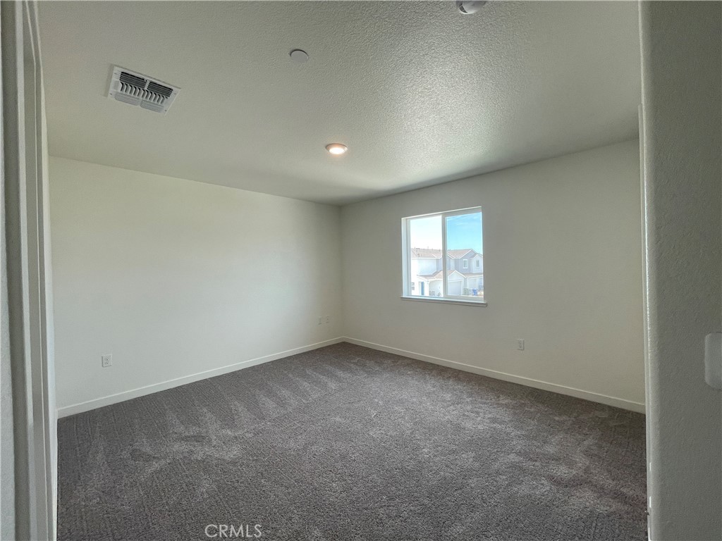 708 Stone Ridge Avenue Merced, CA 95341 - Photo 5 of 6 Representative photo of similar completed home. Actual finishes and materials may vary.