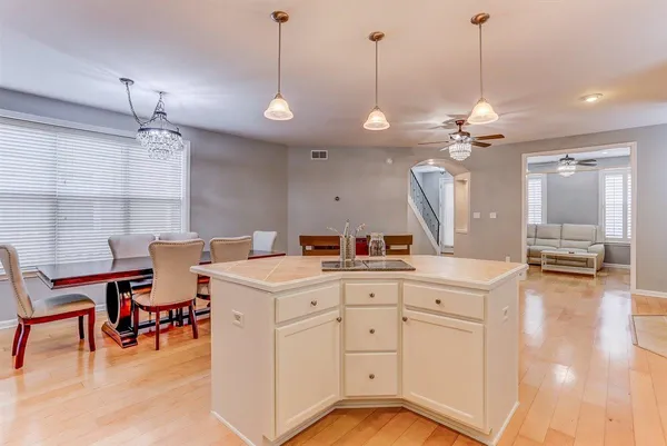 a view of a kitchen area and dining room