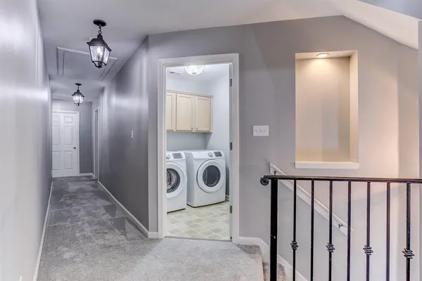 a view of a hallway with entryway