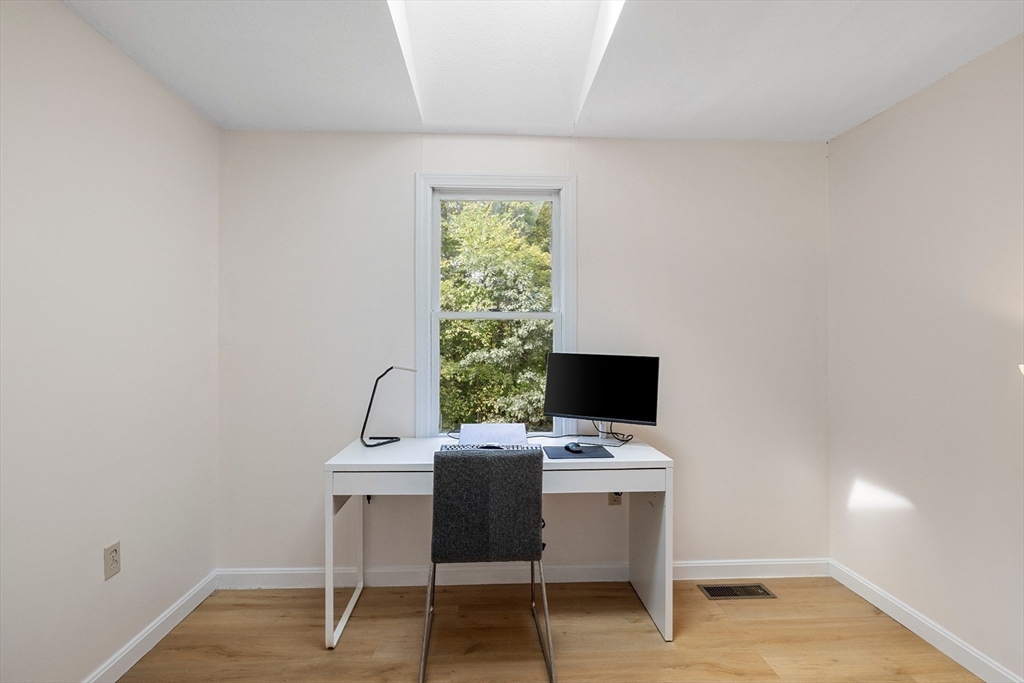 5 Friends Way Pepperell, MA 01463 - Photo 19 of 29 a view of a workspace with furniture and a window