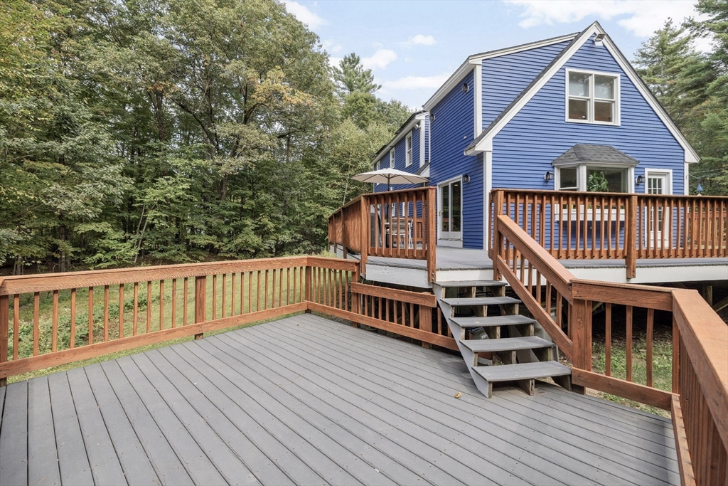 5 Friends Way Pepperell, MA 01463 - Photo 26 of 29 a view of a house with wooden deck