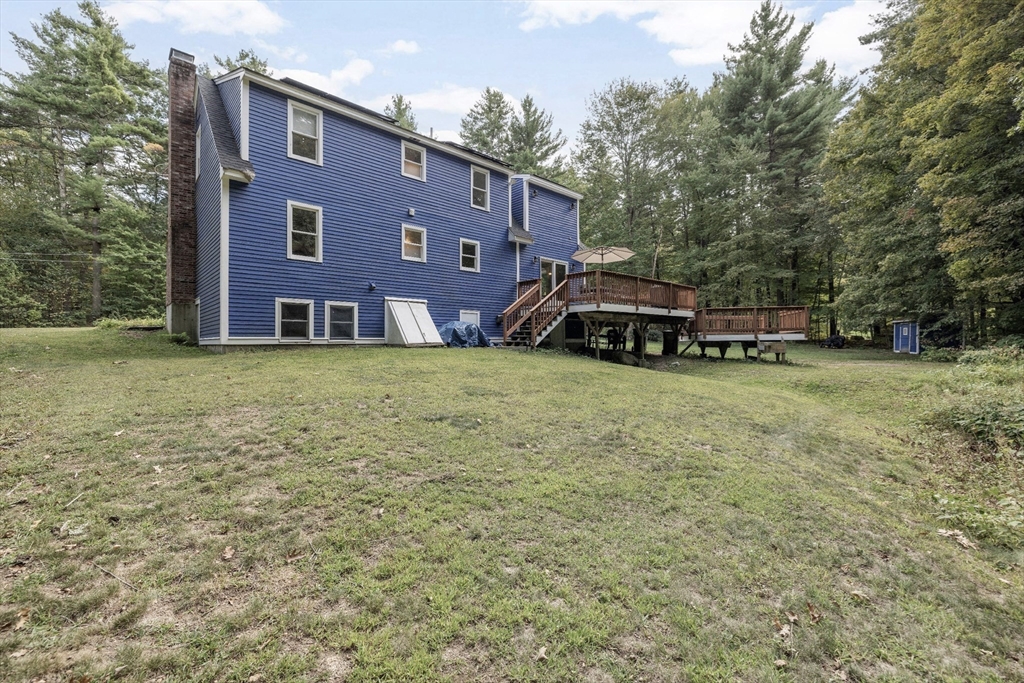 5 Friends Way Pepperell, MA 01463 - Photo 27 of 29 a view of a house with a yard