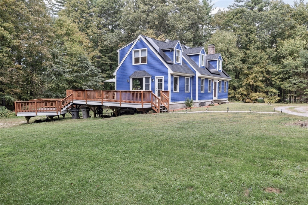 5 Friends Way Pepperell, MA 01463 - Photo 28 of 29 a front view of a house with garden