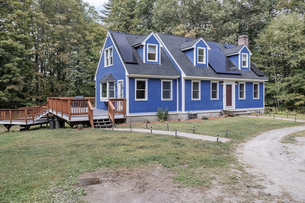 5 Friends Way Pepperell, MA 01463 - Photo 29 of 29 a front view of a house with garden
