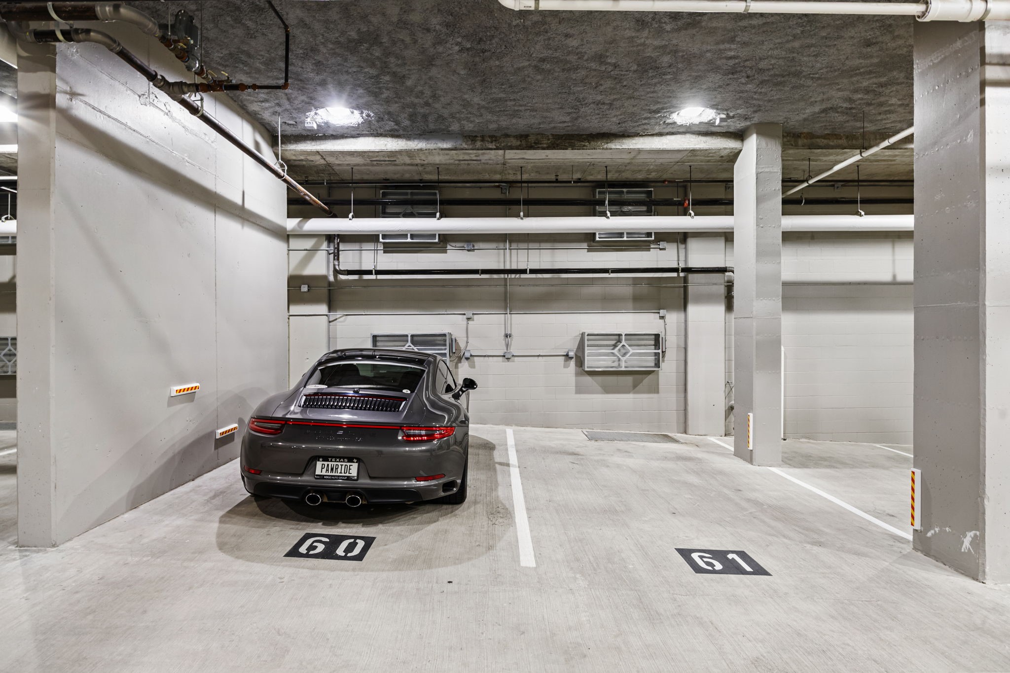 2323 West Main Street, Unit 506 Houston, TX 77098 - Photo 29 of 32 Upgrade: Two “trickle charger” electric plugs installed to charge ICE batteries when travelling for each of two parking spots #60 and #61 (capable of installing electric car charger in between)