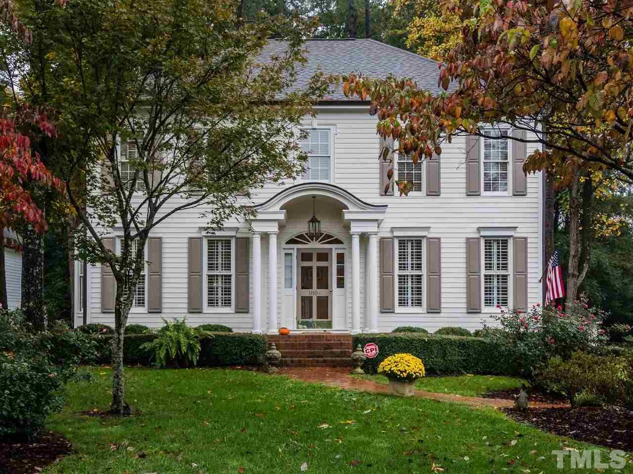 1804 Banbury Road Raleigh, NC 27608 - Photo 1 of 25 a front view of a house with garden and trees