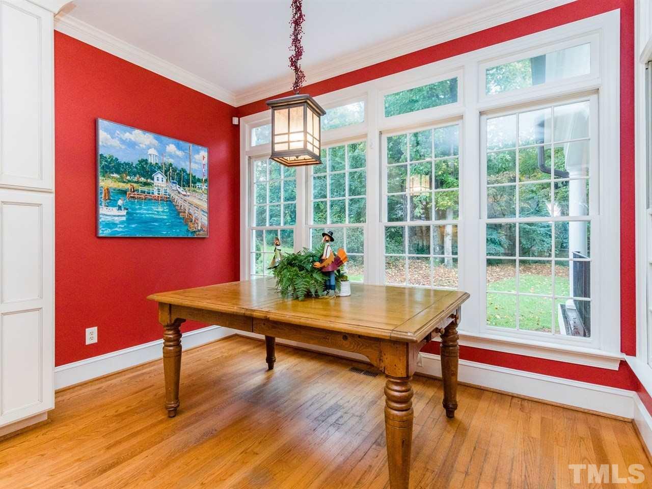 1804 Banbury Road Raleigh, NC 27608 - Photo 13 of 25 a room with furniture and a window