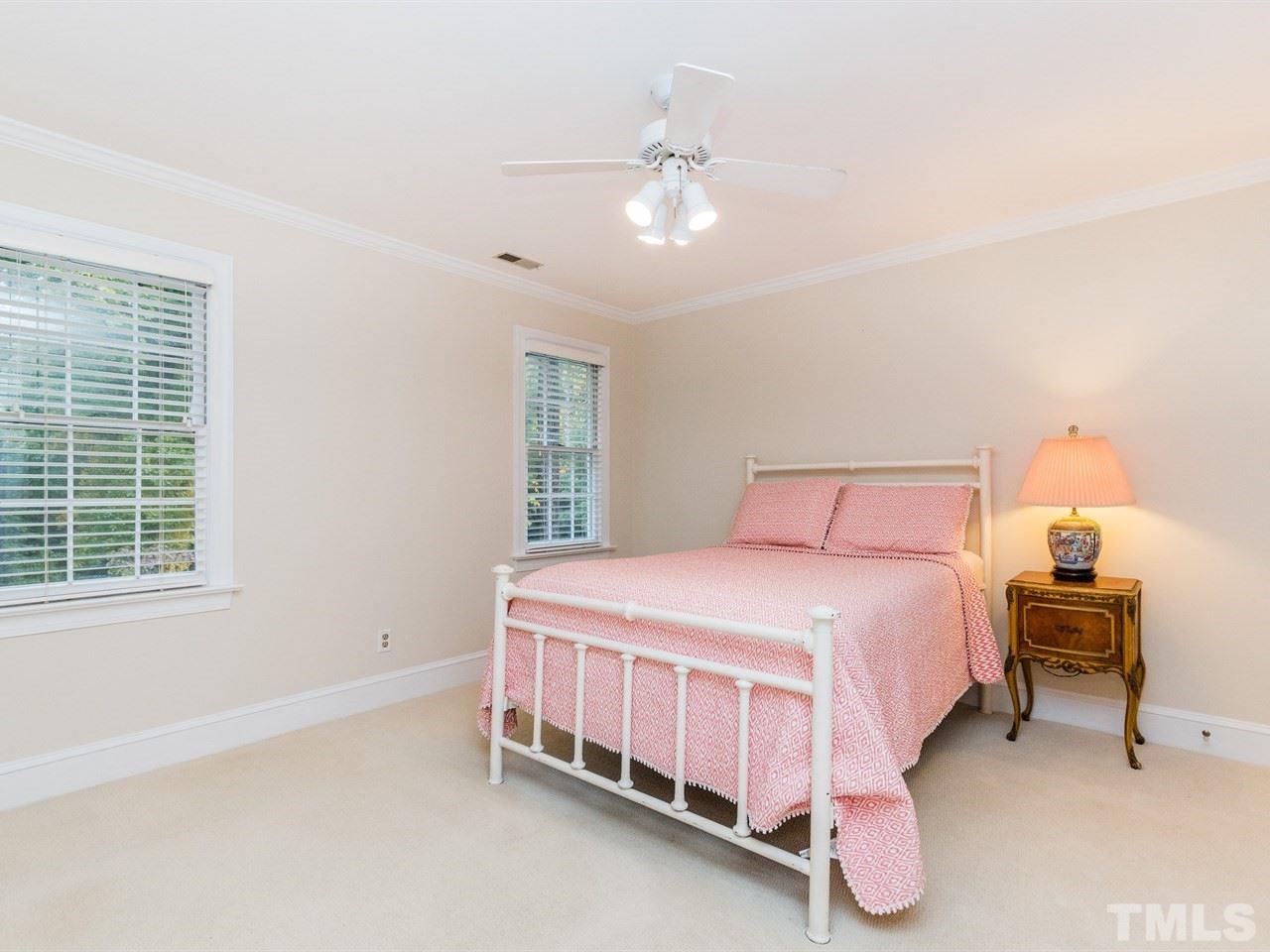 1804 Banbury Road Raleigh, NC 27608 - Photo 18 of 25 a bedroom with a bed and window