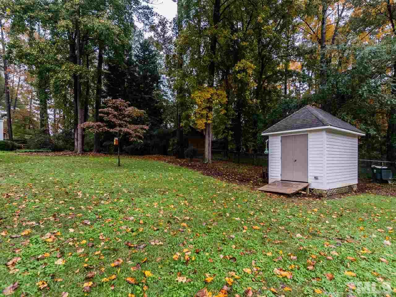 1804 Banbury Road Raleigh, NC 27608 - Photo 24 of 25 a view of a house with a yard