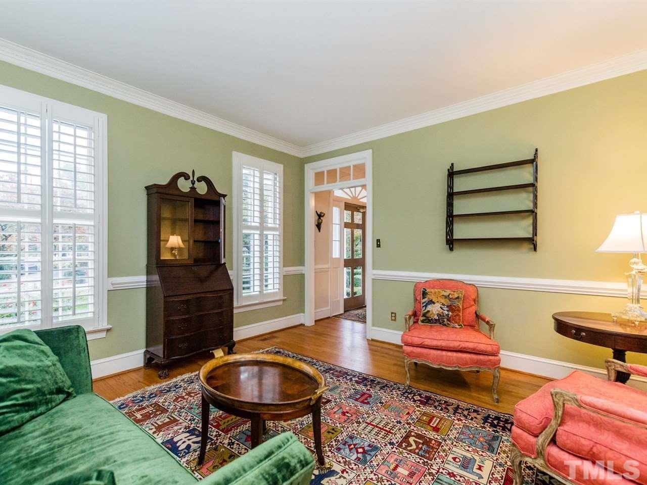 1804 Banbury Road Raleigh, NC 27608 - Photo 5 of 25 a room with furniture and wooden floor