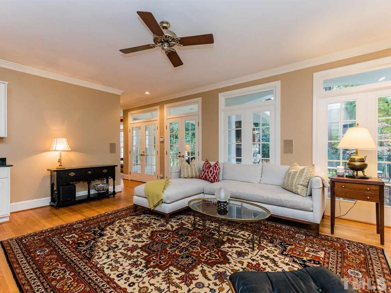 1804 Banbury Road Raleigh, NC 27608 - Photo 8 of 25 a living room with furniture and a fireplace