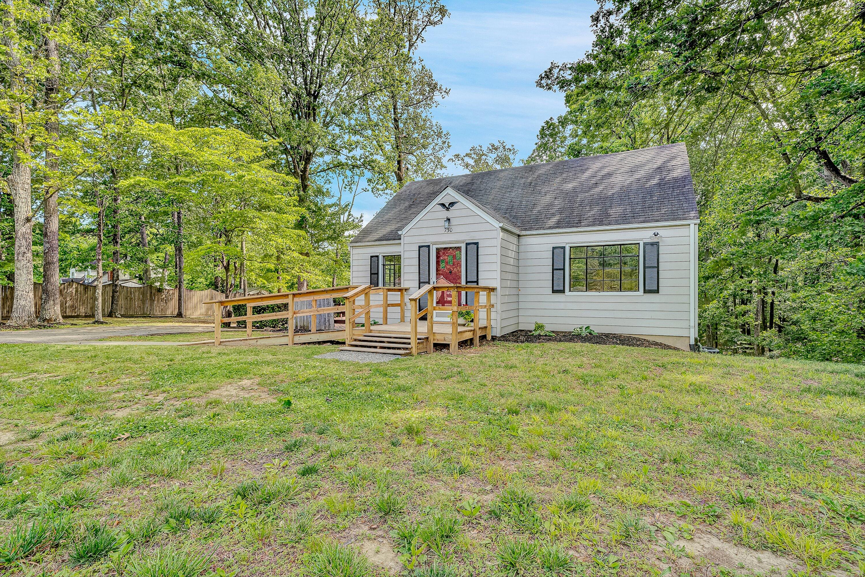 730 Texas Hollow Road Salem, VA 24153 - Photo 1 of 39 a front view of a house with garden