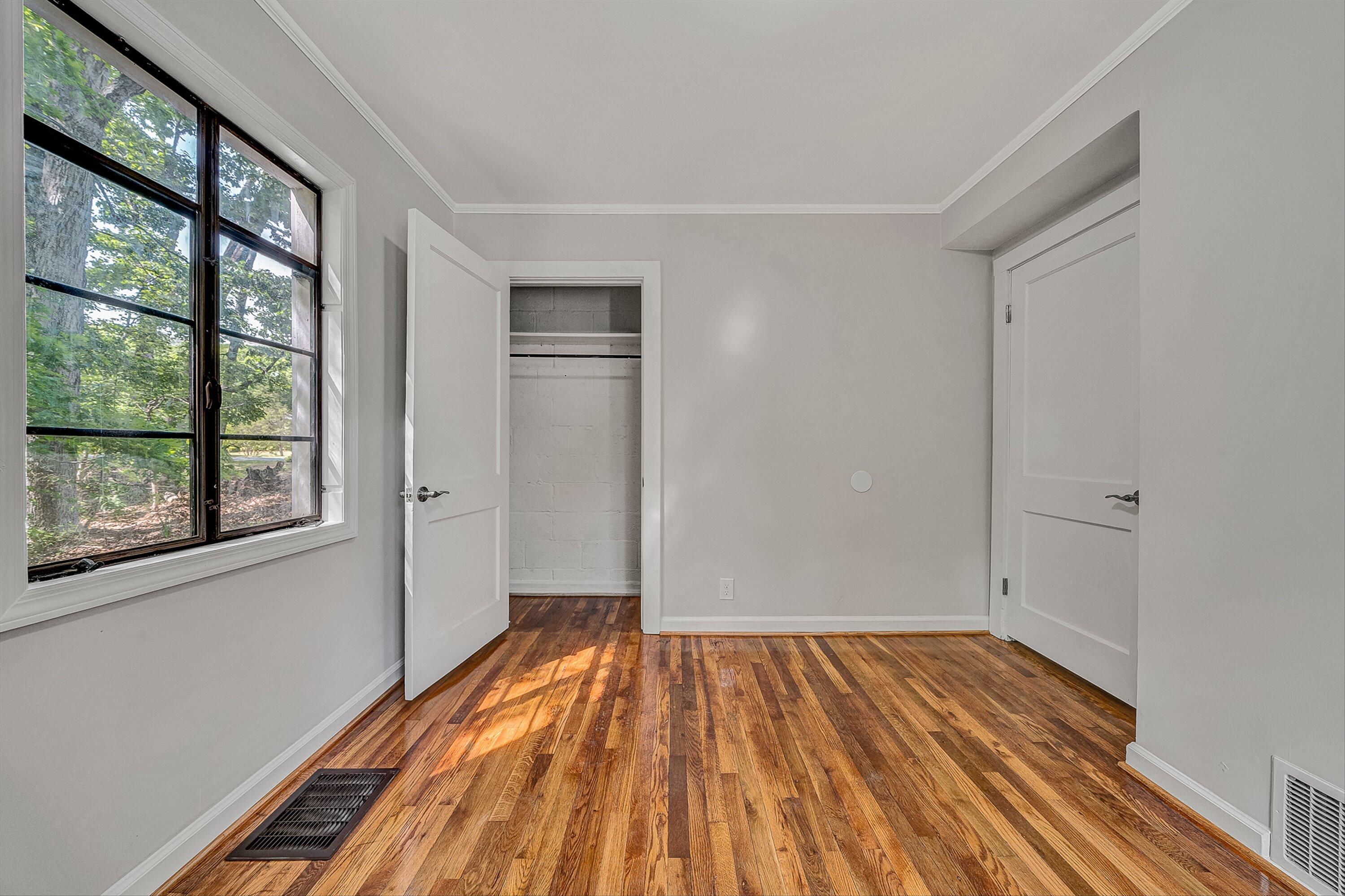 730 Texas Hollow Road Salem, VA 24153 - Photo 18 of 39 a view of empty room with wooden floor and fan