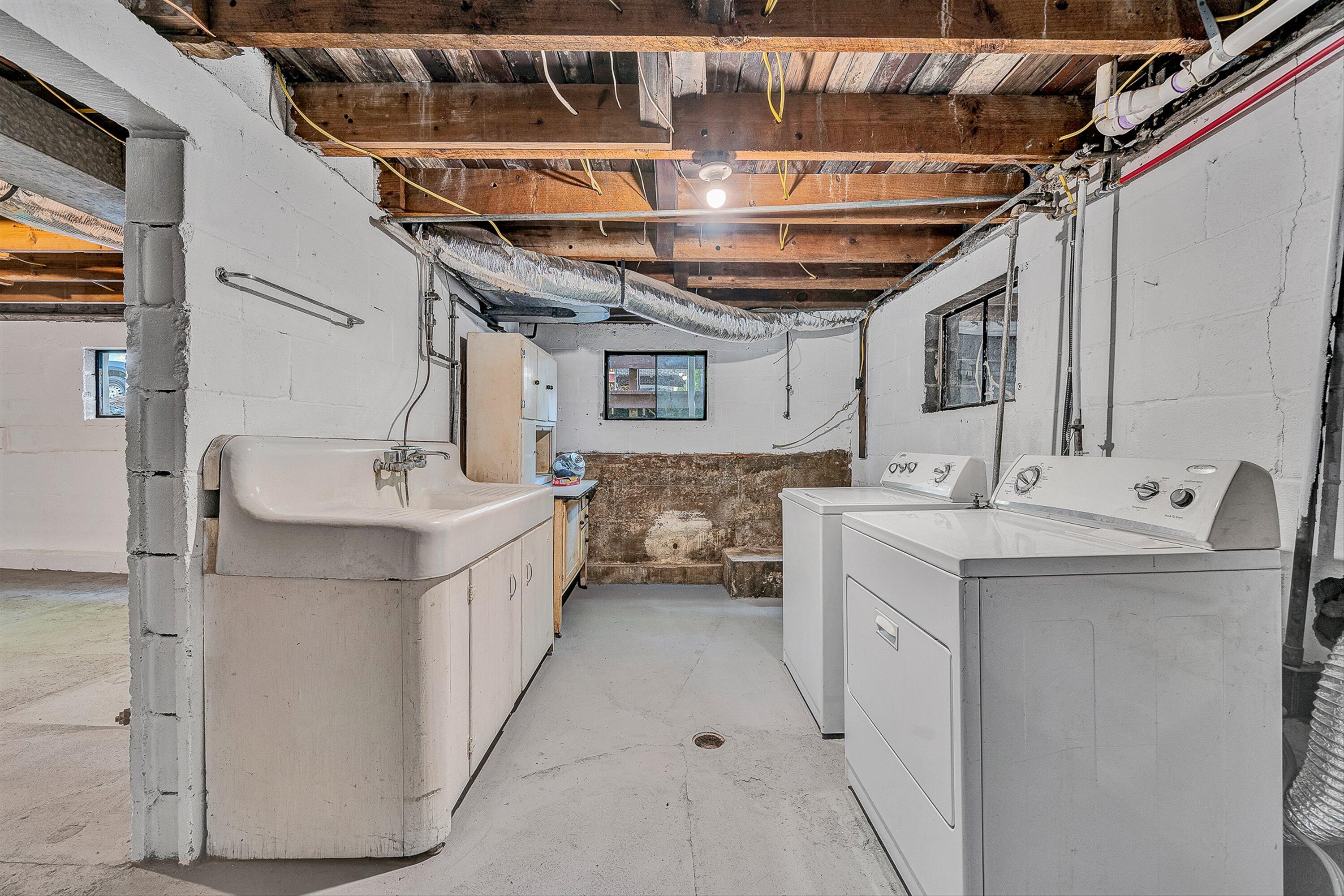730 Texas Hollow Road Salem, VA 24153 - Photo 27 of 39 a utility room with a sink a washer and dryer