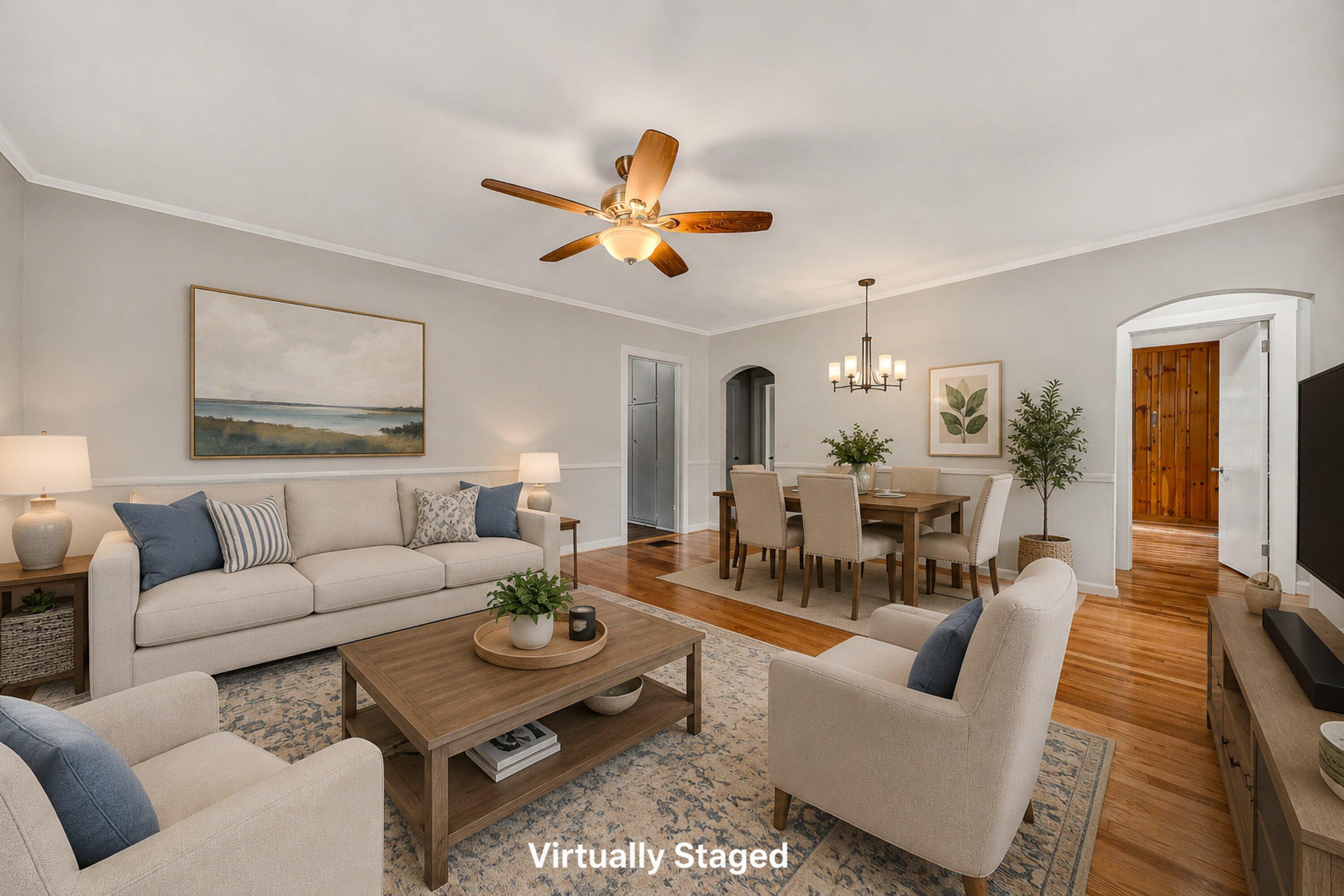 730 Texas Hollow Road Salem, VA 24153 - Photo 3 of 39 a living room with furniture a rug and a chandelier