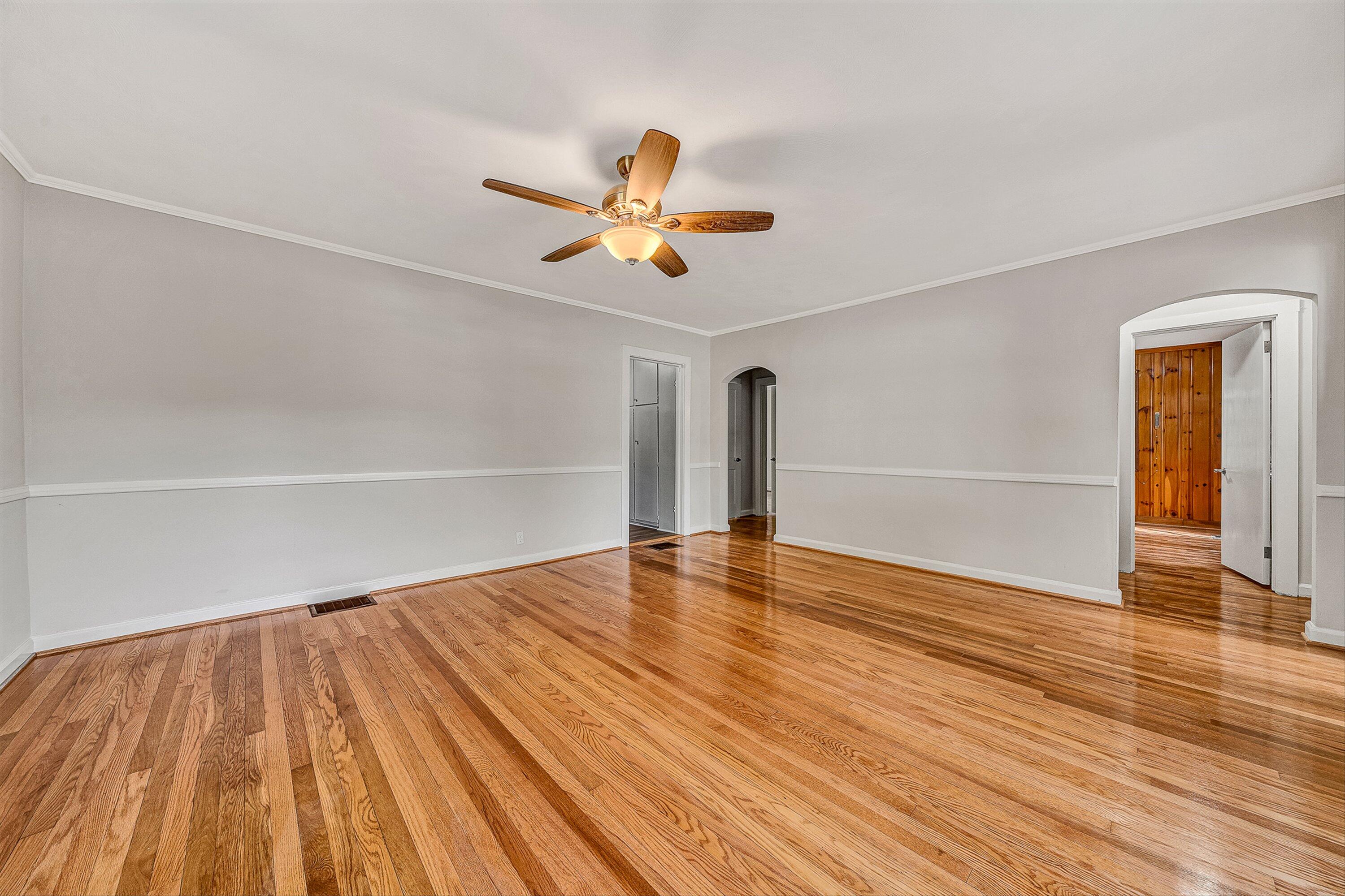730 Texas Hollow Road Salem, VA 24153 - Photo 5 of 39 a view of empty room with wooden floor and fan