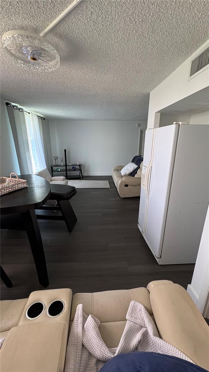 299 Northwest 52nd Terrace, Unit PHX Boca Raton, FL 33487 - Photo 19 of 29 a living room with furniture