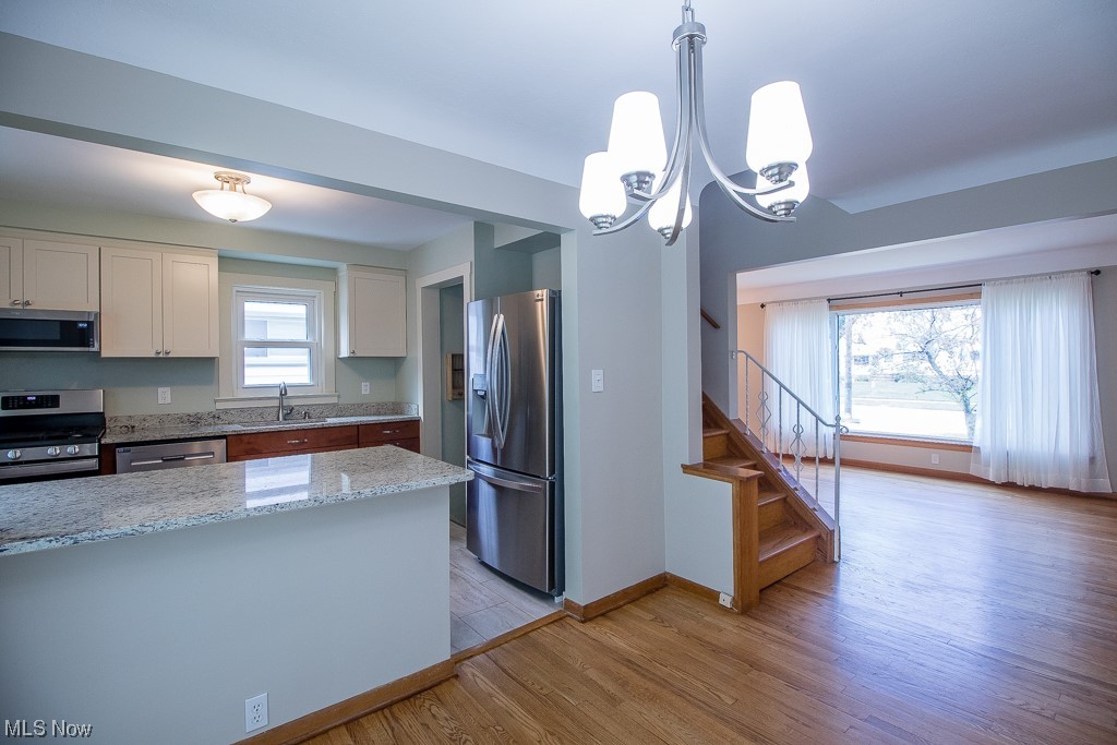 1329 West Miner Road Mayfield Heights, OH 44124 - Photo 6 of 21 Dining Room view to Kitchen and Living Room.