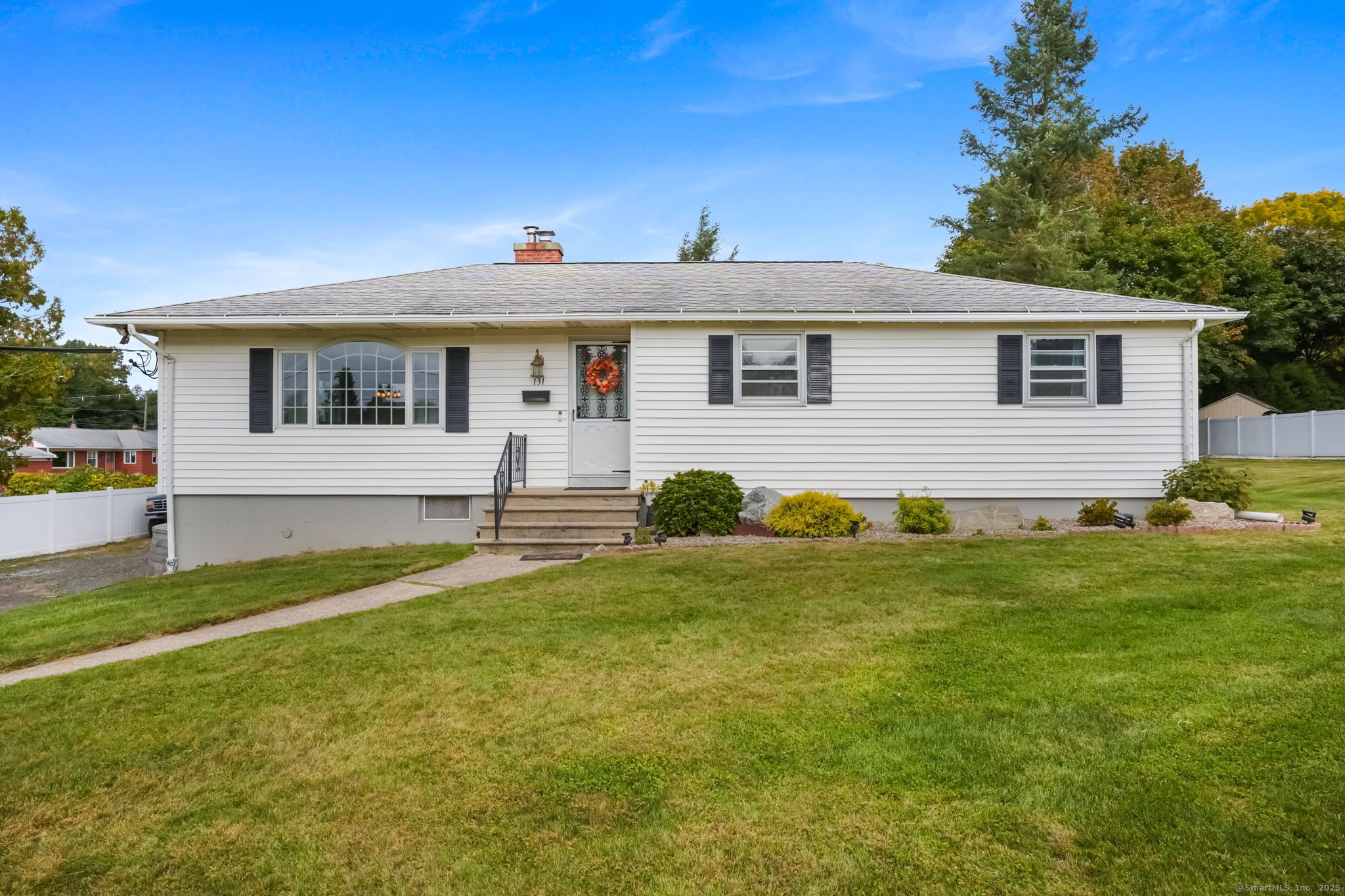 131 Hilltop Road Naugatuck, CT 06770 - Photo 1 of 1 a front view of house with yard and trees